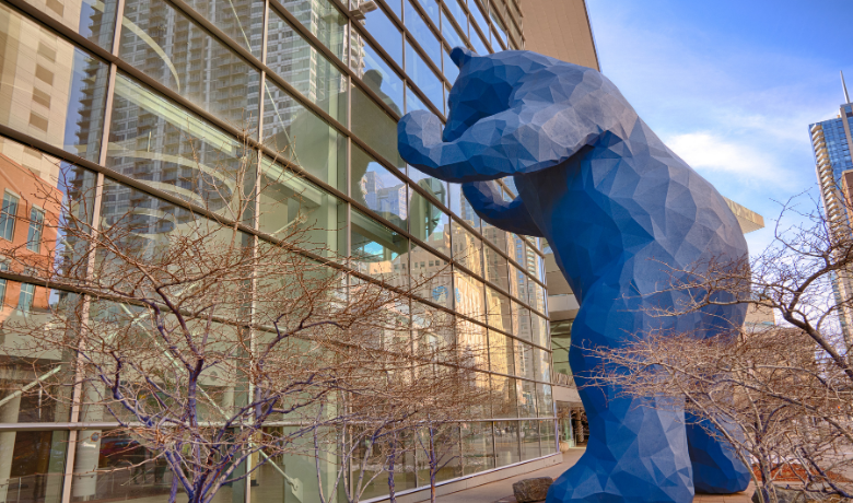   The    Big Blue Bear   ,&nbsp;by artist Laurence Argent, peeks inside the Colorado Convention Center  